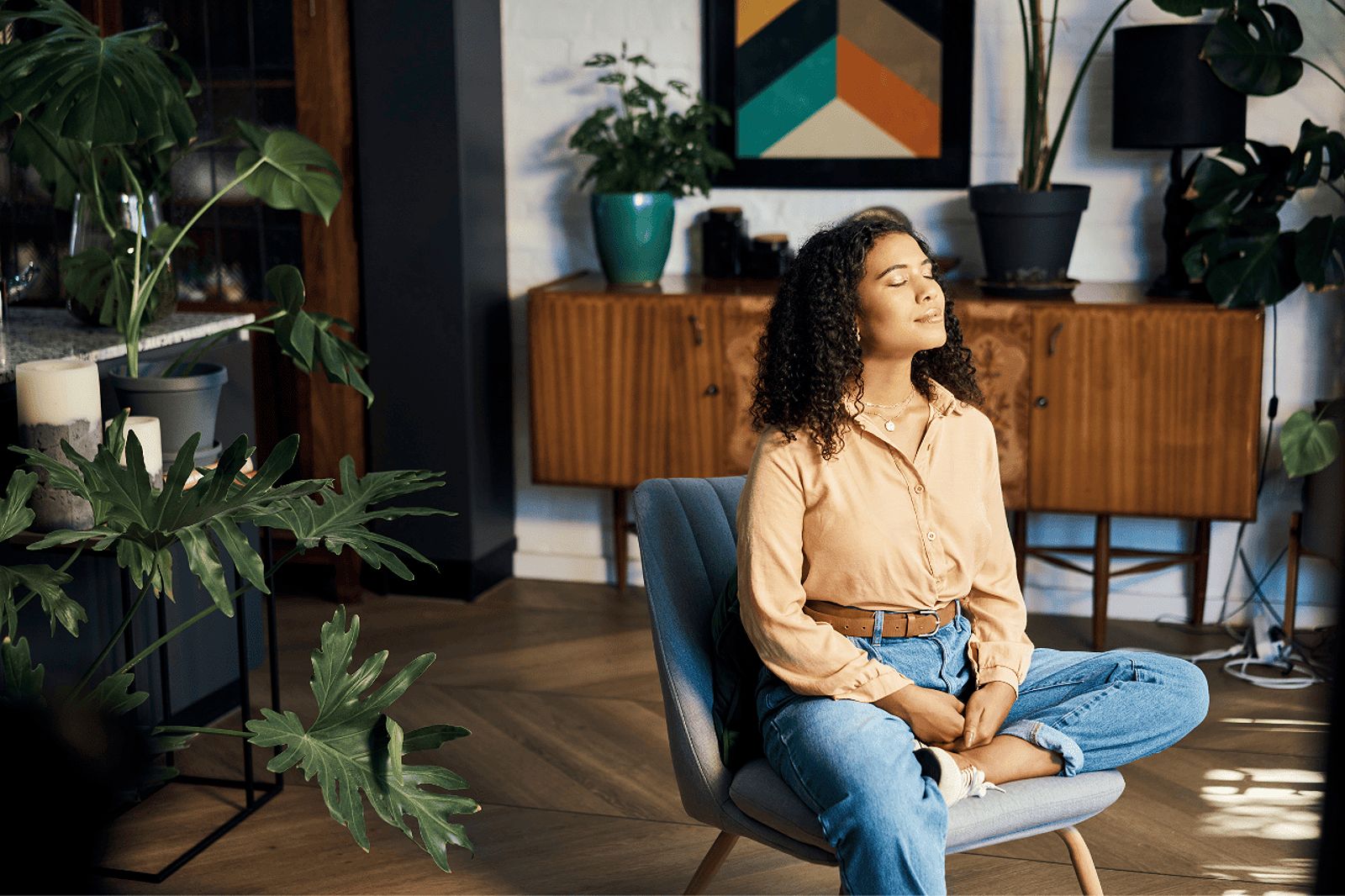 Woman sitting with her eyes closed