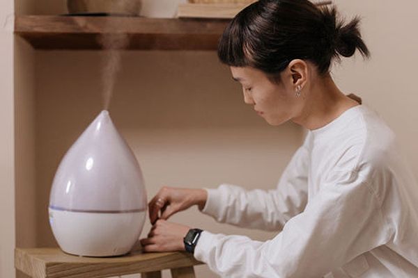 Woman with a humidifier